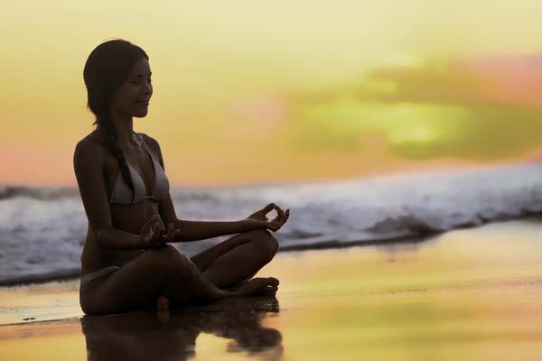 Relaxing on the Beach - Yoga