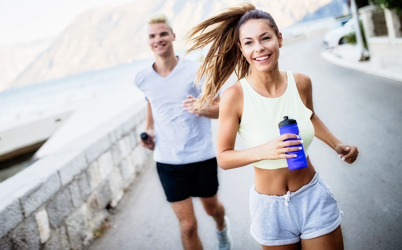 Couple Running in Summer